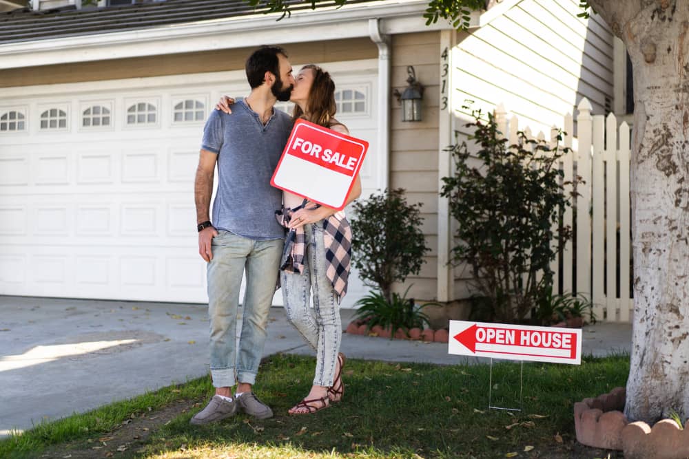 sold home with real estate sign